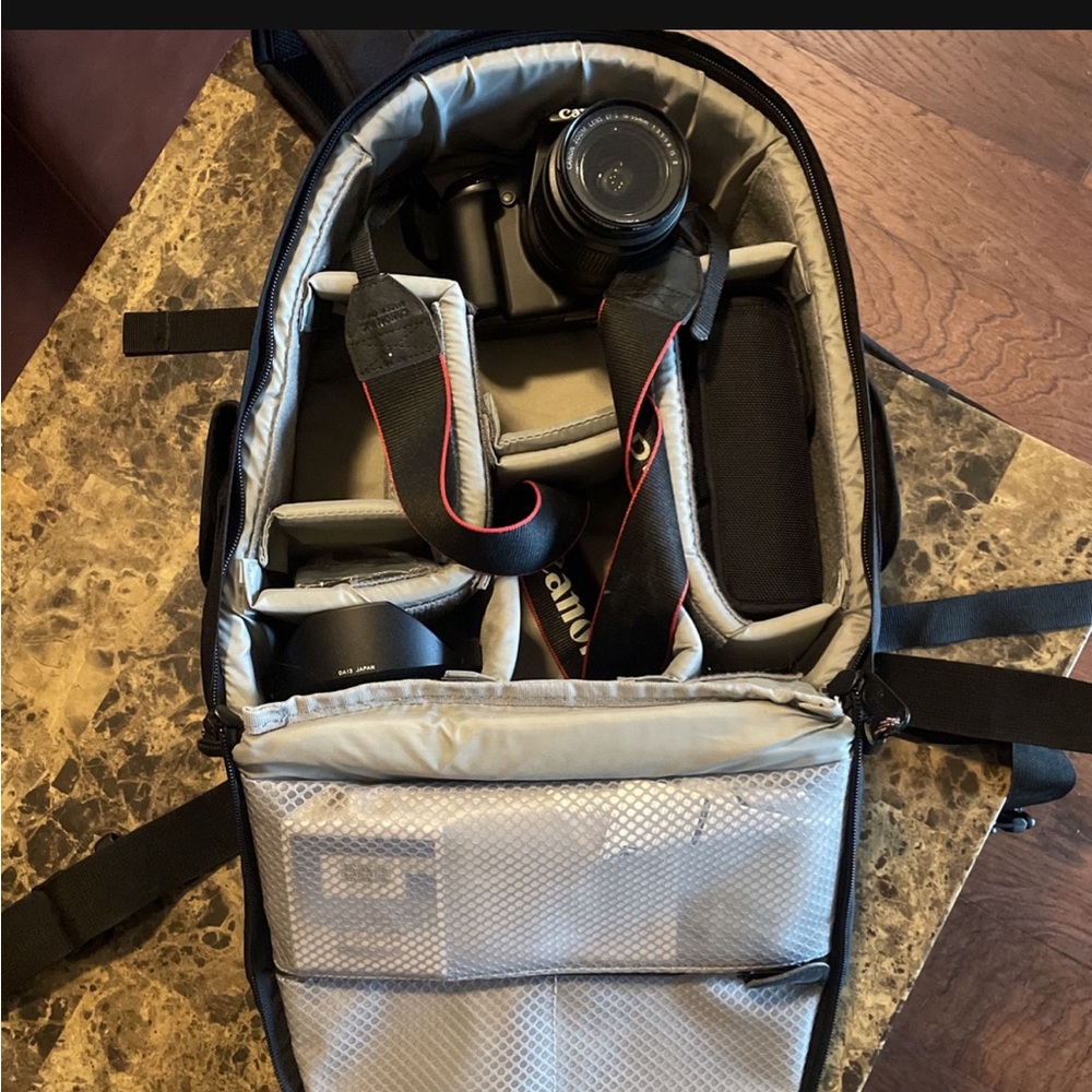 Canon Rebel T3i with 18-55 mm lens, Camera Bag, 430EX Speedlite and a Tripod.